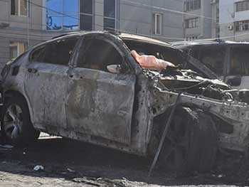 В Днепропетровске футболисту сожгли BMW X6 фото