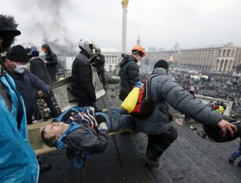 Фото с Майдана: десятки убитых и ожидание столкновений фото