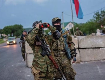 Под Славянском военные расстреляли автобус с ополченцами фото