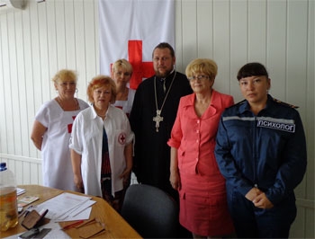 Акимовский район. В терцентре соцобслуживания собирают помощь беженцам фото