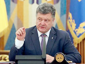 Порошенко анонсировал местные выборы в подконтрольных боевикам районах фото