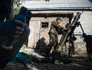 Возле Донецкого аэропорта не прекращаются боевые действия фото