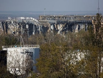 Военные Украины и РФ обсудят прекращение огня в аэропорту Донецка фото