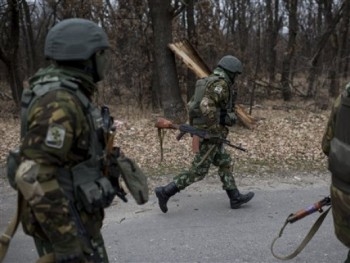 Украинская сторона готова к отводу тяжелого вооружения фото