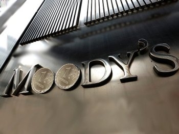 Moodys понизило рейтинг РФ фото