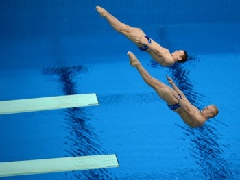 Украинцы выиграли золото на этапе Гран-при по синхронным прыжкам фото