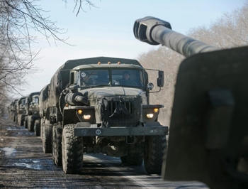 Вместо отвода вооружений, боевики перебрасывают технику на мариупольское направление фото