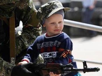 ОБСЕ зафиксировало среди боевиков вооруженных детей фото