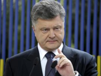 Порошенко считает, что Россия заплатила Януковичу взятку фото