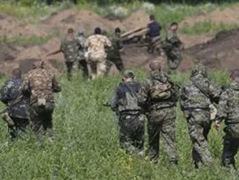 Боевики под видом мирных жителей массово возвращаются в Украину фото