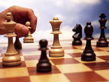 В клубах по месту жительства сражались шашисты и шахматисты фото