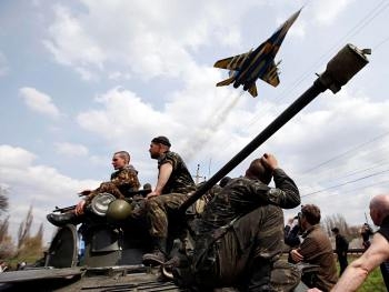 Военный конфликт на востоке Украины спровоцирован Кремлем фото