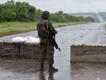 На въезде в Донецк боевики устроили перепись фото