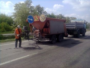 В Запорожье ремонтируют дороги фото