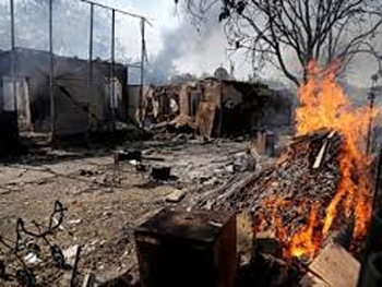 Названо, сколько домов мирных жителей сгорело в зоне АТО в августе фото