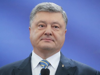 Порошенко: экономика растет невзирая на кризис фото