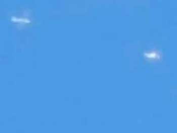 Очевидец снял на видео погоню самолета за НЛО фото