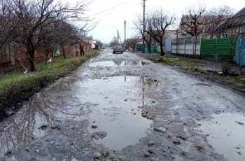 Ямы на дорогах Нового Мелитополя поражают воображение  фото