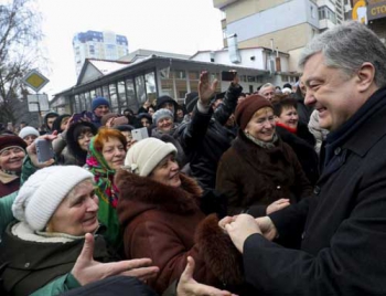 Рабочие поездки Порошенко не являются агитационными, - Верховный суд фото