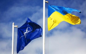 Совет НАТО отказался от идеи посетить Украину в июле фото