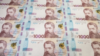 НБУ прокомментировал «пиратский шрифт» на купюре в 1000 гривен фото