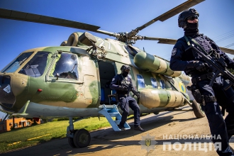 Для безопасности выборов в Мелитополь авиацией перебросили спецназ фото