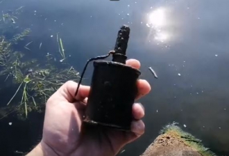 Недалеко от запорожских мостов рыбак нашел гранату фото