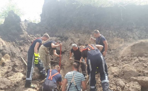 Трагедия в Днепропетровской области: обвалился карьер, под завалами отец и ребёнок фото