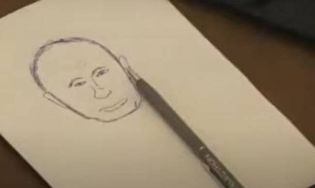 Депутат Львовского горсовета рисовал портрет Путина во время сессии  фото
