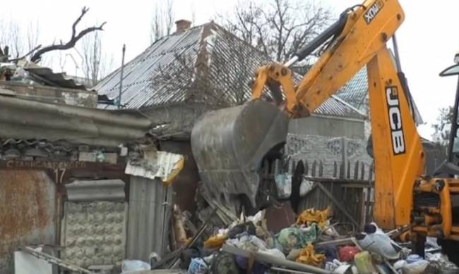 Под мусором в Мелитополе нашли труп женщины  фото