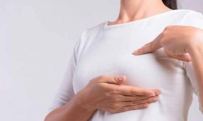 Названі симптоми раку грудей, які часто пропускаються жінками фото